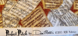 red sheet music quality quilters cotton fabric, Perfect Pitch by Dan Morris 2011 RJR fabrics, sheet music on a red background