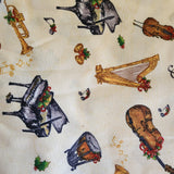 yellow instrument Christmas fabric, Joyful Noise Tara Reed Licensed to South sea imports, quality quilters cotton fabric