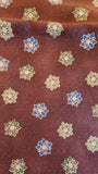 brown quilters cotton fabric by the yard with green and blue flower shapes, Arabesque by Claudia Pfeil for Benartex style #1246