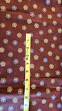 brown quilters cotton fabric by the yard with green and blue flower shapes, Arabesque by Claudia Pfeil for Benartex style #1246