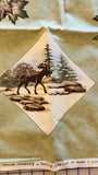 Wildlife sage green fabric panel with bear, moose, canoe, leaves, Canoe Country by Holly Taylor for Moda