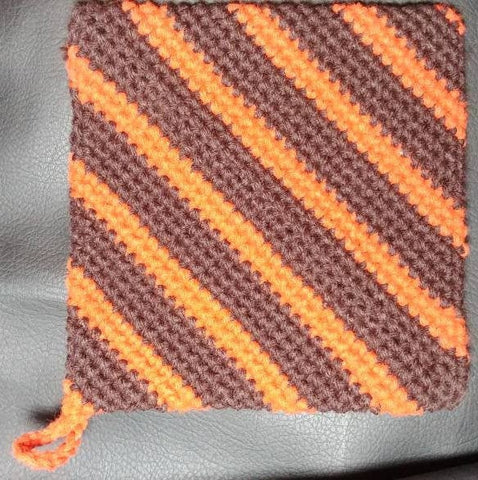 Crochet pot holder, orange and brown hot pad, trivet, double thick